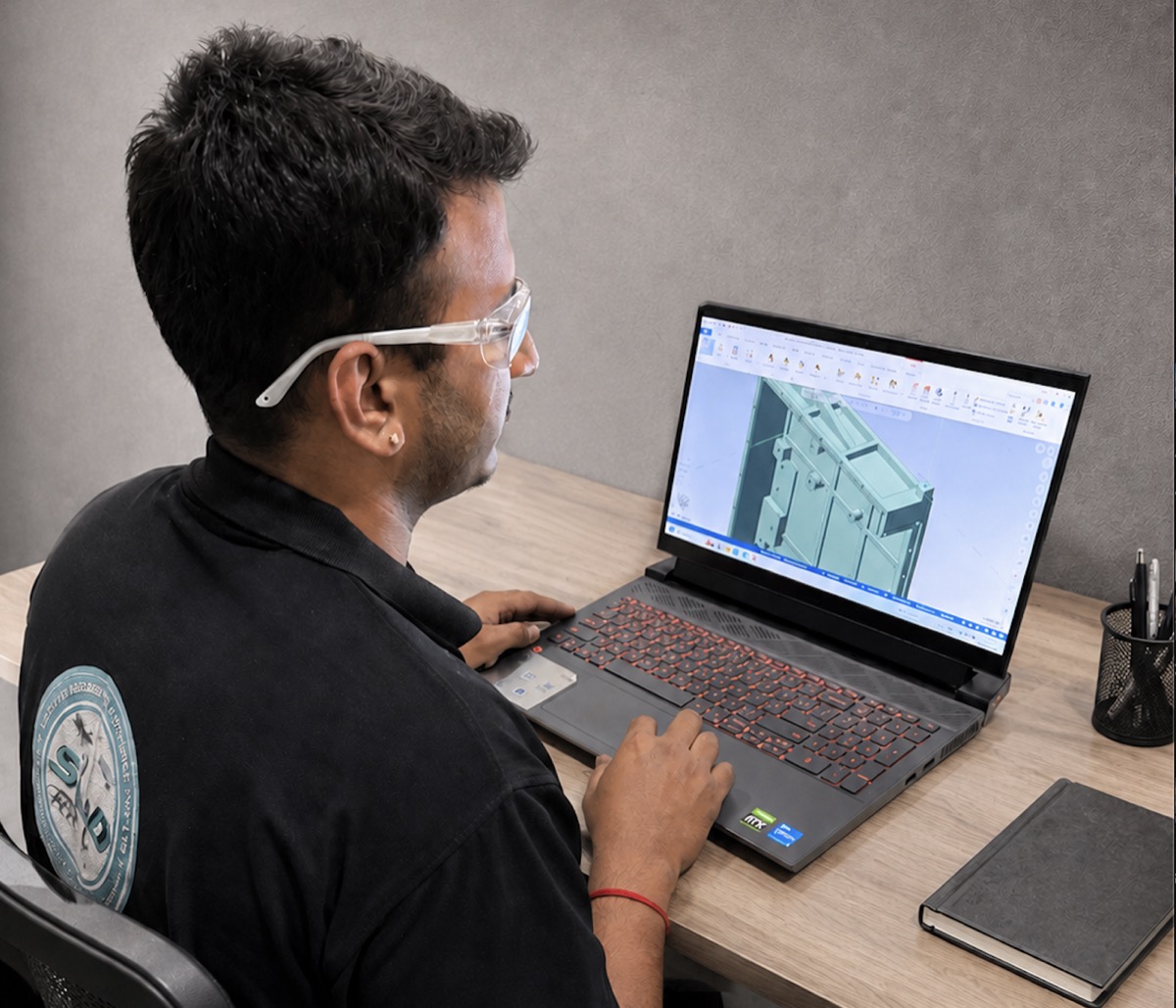 An engineer modelling a component in CAD before machining